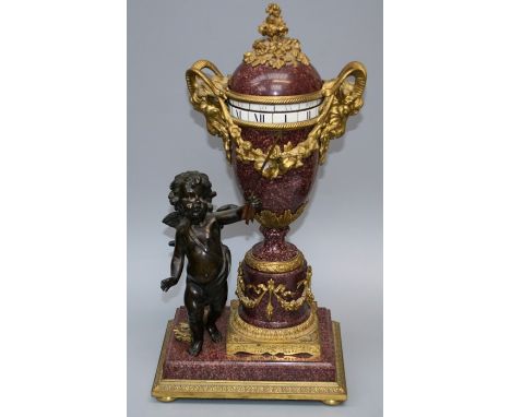 A 19th century, Louis XVI style porphry and ormolu eight day cercle tournant mantel clock in the manner of Leroy of Paris. Cu