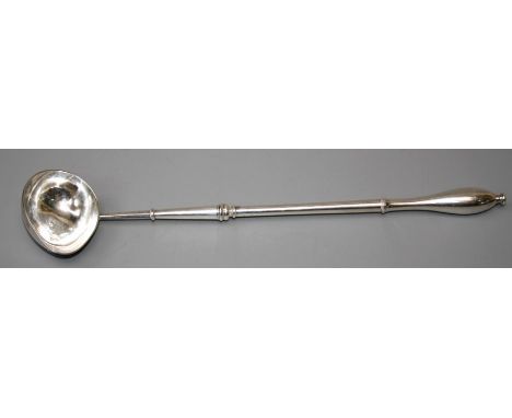 A Geo II silver toddy ladle with&nbsp; ovate shaped bowl and heavy white metal handle.
London 1737 maker not found.
7.8 Troy 