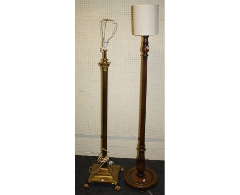 A Victorian heavy brass "Corinthian" column, telescopic standard lamp. 128cm high.Together with a vintage turned wood standar