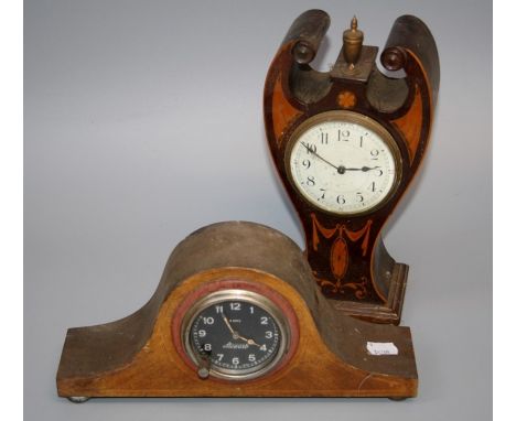 An Edwardian mahogany and boxwood swag inlaid mantle clock, the winged case with urn finial enclosing an eight day movement f