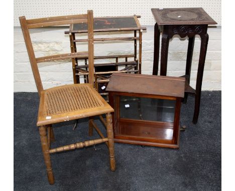 A chemist's balance cabinet, a bamboo and lacquer panel canterbury table a carved oak lamp table and a single cane seated bed
