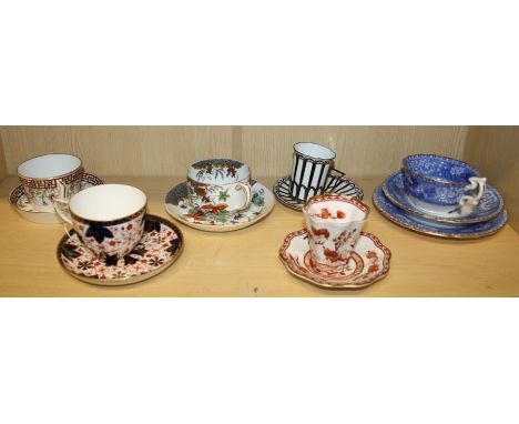 A small collection of trios, cabinet cups and saucers including Minton, Coalport, Spode and other factories.