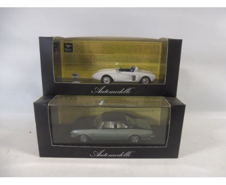 Two boxed Automobilia Dreams Engaged Series models Ford Mustang and Fitch Spirit.