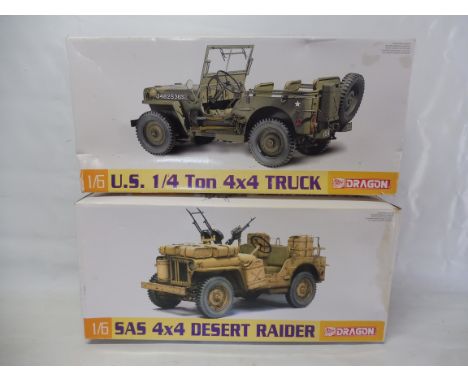 Two boxed Dragon sets SAS 4x4 Desert Raider, box damage and a US 1/4 4x4 truck 1/6 scale, both unmade.