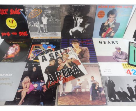 A box of mixed Genre Albulms To include The Jam ,Ian Drury Blondie and others 