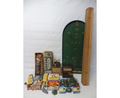 A selection of assorted  games including bagatelle, Pelham puppet, boxed steam plant etc.