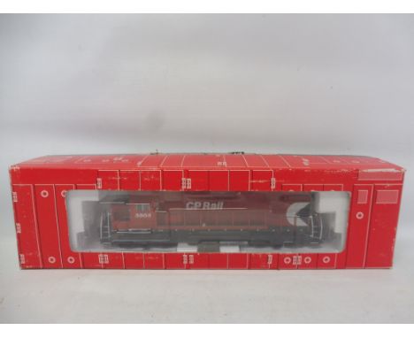 A boxed Atlas ho scale Canadian Pacific locomotive.