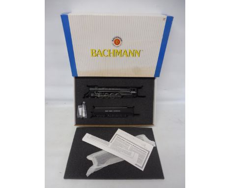 A boxed Bachmann New York Central American diesel locomotive.