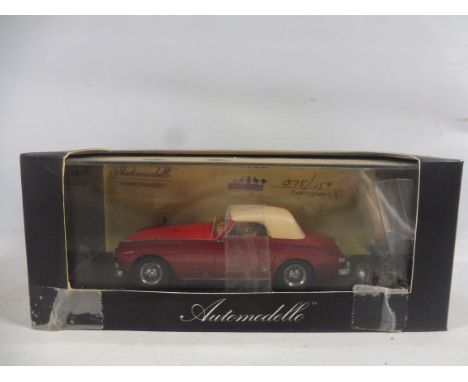 A boxed Automobilia Dreams Engaged Series model 1962-64 Cunningham C3, 034/159.
