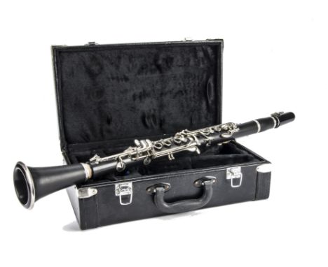 Clarinet, an unmarked clarinet appearing to be complete and in reasonable condition with a hard case 