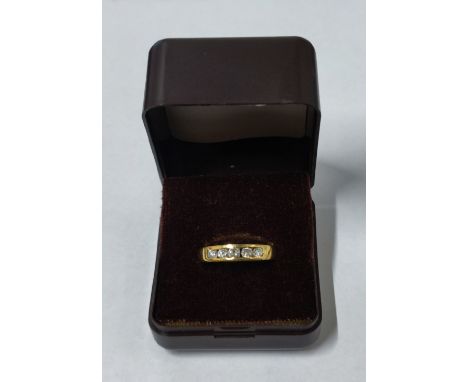 An 18ct. Yellow Gold and Diamond half-hoop ring with five round brilliant cut Diamonds approx. 1/2ct., 4.9 grams gross, size 