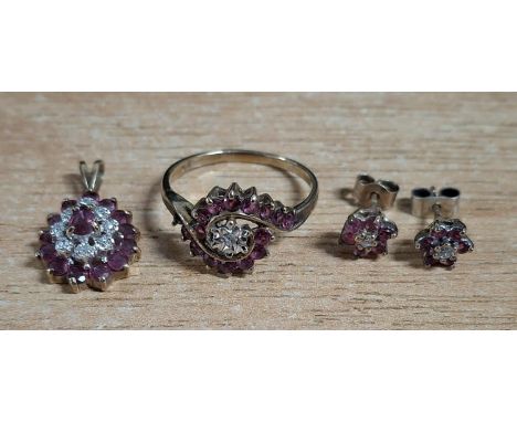 9ct yellow gold trio set consisting a ring, a pendent and earrings, all with round cut Amethysts with a central small round c