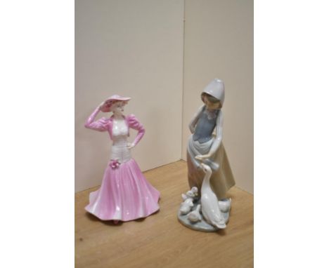 A Lladro porcelain figurine 'Snails For The Ducks' 24cm sold along with a Coalport bone china figurine Summer Romance from th
