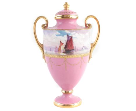 Minton lidded vase signed J.E. Dean , painted with barges and sailing ships within a jewelled gilt and pink ground, 18cm high