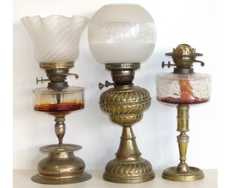 Victorian embossed brass oil lamp and two others. Condition reports are not available for Interiors  Sale