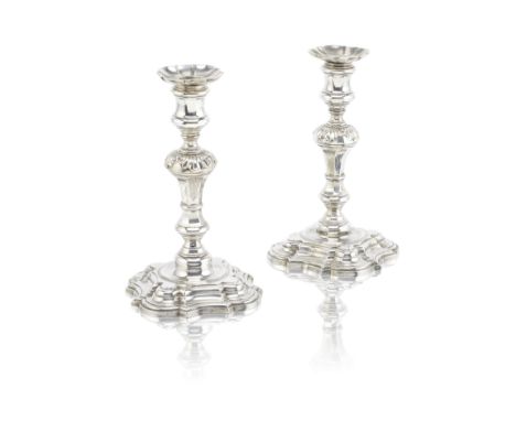 A pair of 18th century Royal German silver candlesticksBalthasar Friedrich Behrens, Hanover 1744 / 1750, the bases engraved '