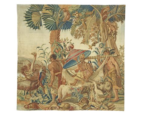 A French second quarter 18th century tapestrywoven in wool and silk threads, the whole depicting an exotic scene with palm tr