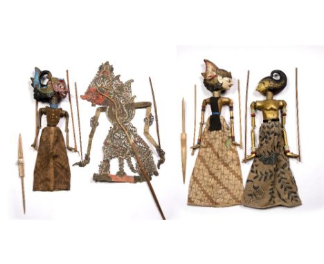 Javanese leather shadow puppet 81cm, and three painted wooden Javanese puppets, 53cm - 69cm, (4)