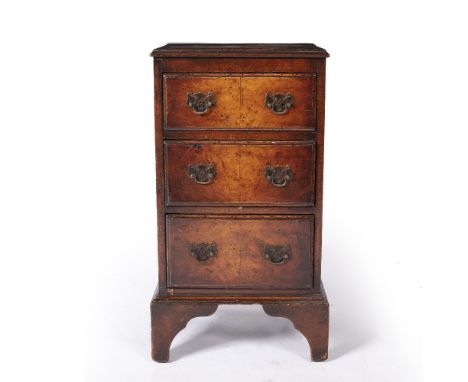 Three drawer walnut chest standing on bracket feet, 1930's reproduction, 71cm high x 40cm wide x 31cm deep