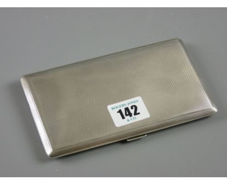 A full size oblong engine turned gentleman's silver cigarette case, 7.9 ozs, Birmingham 1951