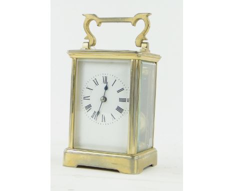 A French brass cased carriage clock,
stamped R & Co., Paris, height 4.5".