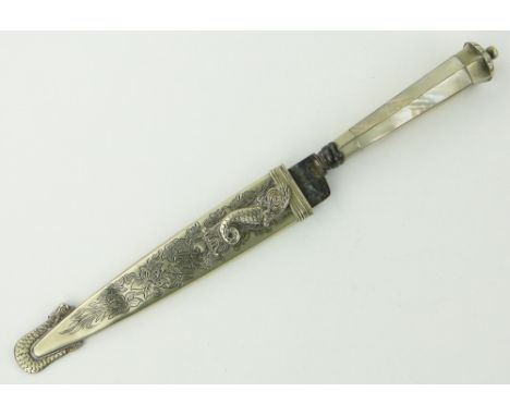 An Eastern knife
with mother of pearl handle, white metal scabbard with fish decoration, 11".