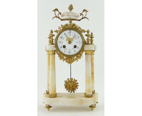 A French marble 4 pillar mantel clock,
having a floral enamel dial with 2-train movement and ormolu mounts, GWO, height 15.5"