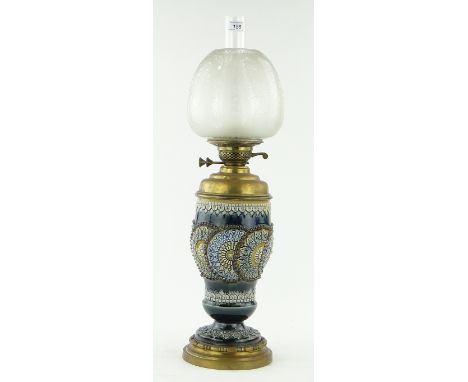 Impressive Victorian Doulton Lambeth baluster oil lamp,
the bulbous Silicon stoneware body having raised circular geometric p