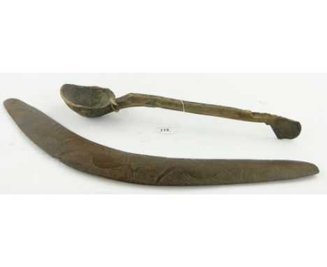 A carved wood boomerang
and a ladle length 19" (2).