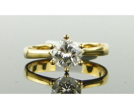 A solitaire diamond ring,
approx. 0.7cts, 18ct gold settings, size K.