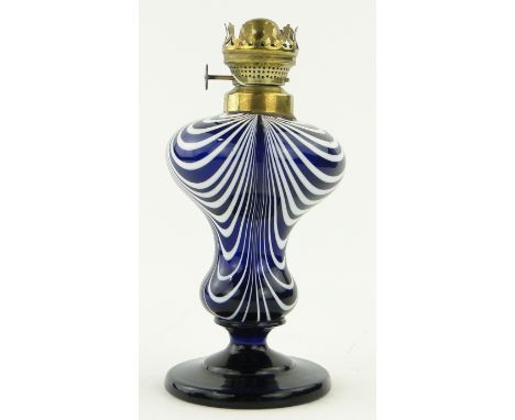 A blue and white glass oil lamp,
8.5".