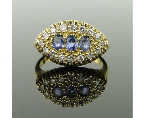 A sapphire and diamond cluster ring,
18ct gold settings, size K.