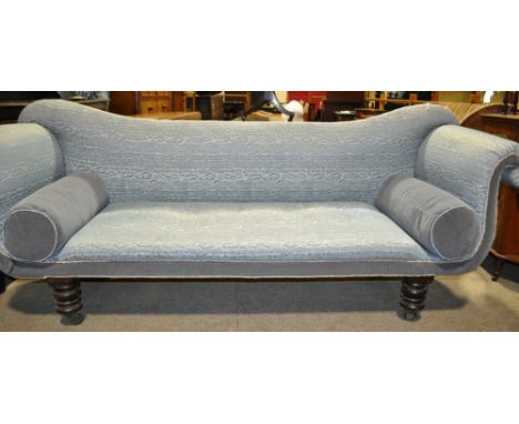A Victorian upholstered rollover arm sofa,
raised on turned mahogany legs, length 7'8, depth 2'4.