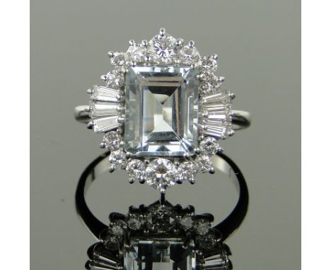 An aquamarine baguette and brilliant-cut diamond cluster ring,
aquamarine approx. 3cts, diamond content approx. 1ct, unmarked