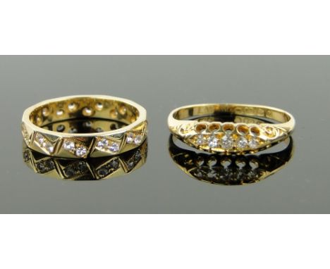 2 18ct gold diamond set rings.