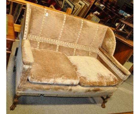 A William and Mary style upholstered 2-seater sofa,
having shaped sides with carved oak stretchers and legs, width 4'6, back 