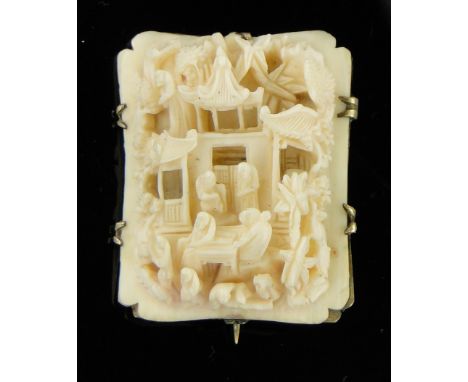 A 19th century Chinese relief carved ivory panel brooch,
unmarked yellow metal settings, height 42mm.