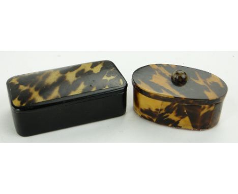 An oval tortoise shell clad snuff box,
length 2.4" and another snuff box, (2).