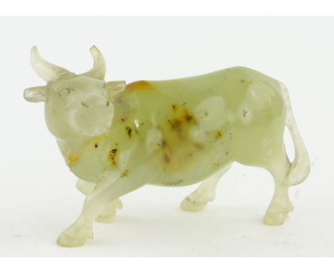 A carved jade waterbuffalo
length 3.75".