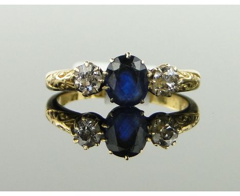 18ct gold 3 stone sapphire and diamond ring,
sapphire height 6mm, size K.