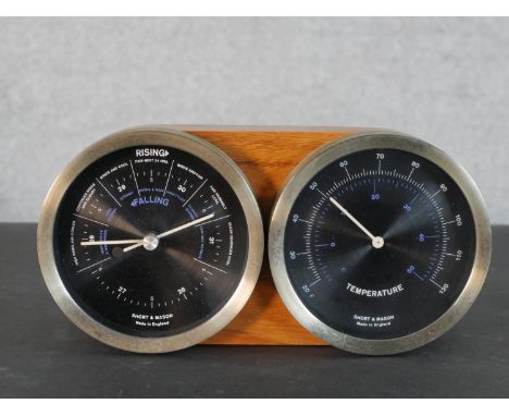 A Short &amp; Mason vintage barometer / thermometer mounted in zebrawood made by Kenneth Grange. H.12 W.25 D.6cm 