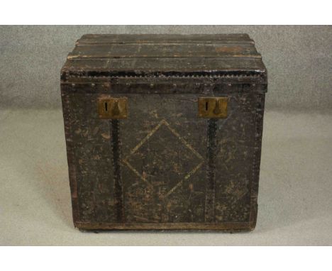 A circa 1890 Louis Vuitton steamer cabin trunk, grey canvas with wood binding, a lozenge painted to the front, iron swing han