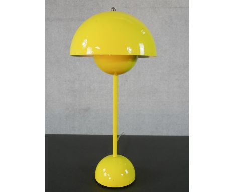 A contemporary flowerpot desk lamp in yellow by Louis Poulsen for Verner Panton. Domed half sphere in yellow lacquer on alumi