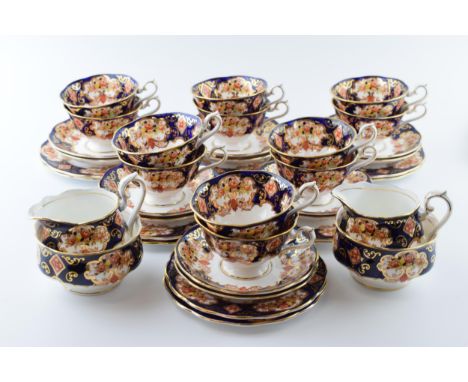 Royal Albert Heirloom tea ware to include 12 cups, 12 saucers, 12 side plates, 2 milk jugs, 2 sugar bowls and 2 cake plates (