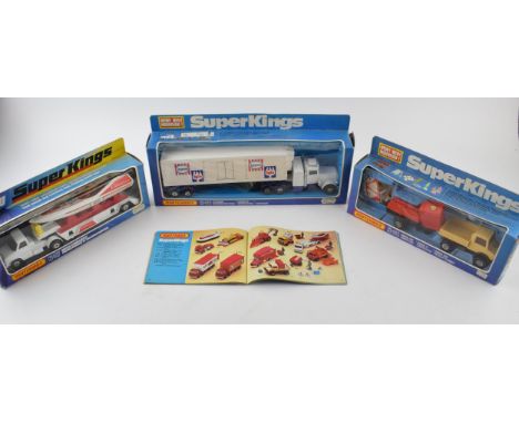 Boxed Matchbox Super Kings K-27 'Miss Embassy' Powerboat and Transporter, K-30 Unimog and Compressor and K-31 Peterbuilt Refr