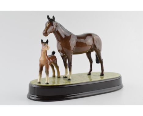 Beswick brown foal and mare on ceramic base.  In good condition with no obvious damage or restoration. Potentially a one off 