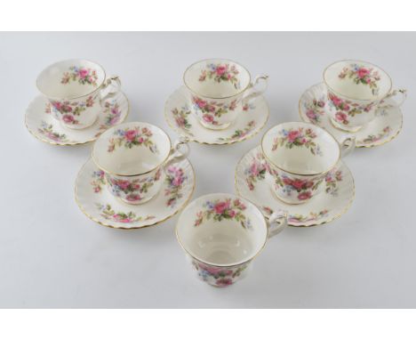 Royal Albert cups and saucers in the Moss Rose pattern to include 6 cups and 5 saucers (11).  In good condition.