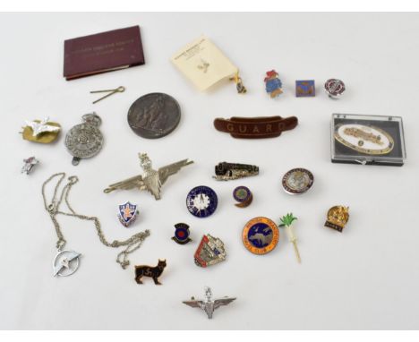 A good collection of vintage enamel badges and similar items of railway, military and civilian interest. Of note BR Guard bad
