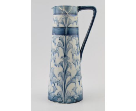 Early Moorcroft blue and white Florian pitcher, 28cm tall (restoration project).  