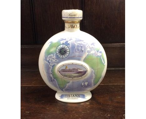 1 x cylindrical 70 cl presentation P&amp;O decanter containing XO Cognac. (1).